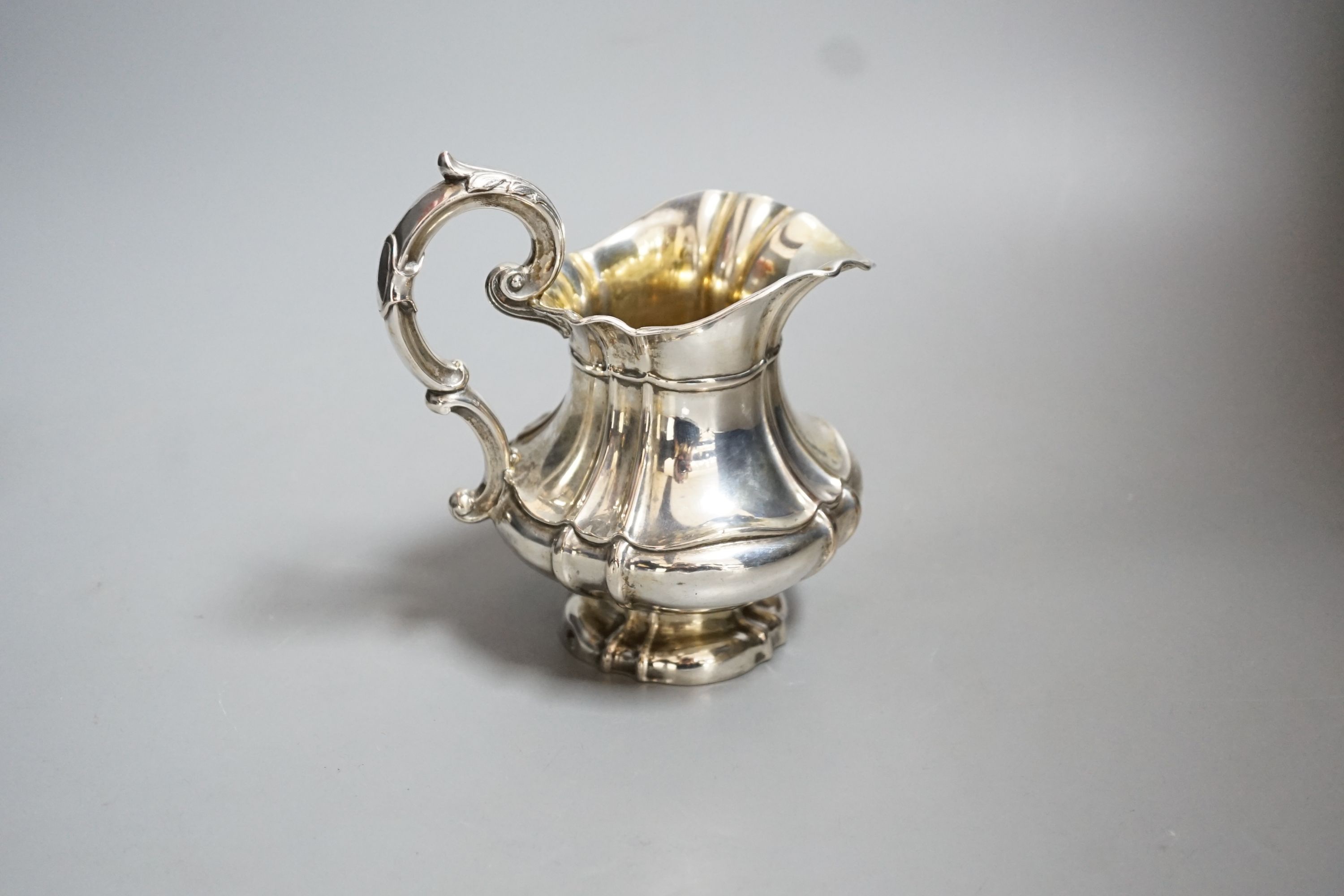 A continental white metal cream jug, 14cm, 5.5oz.